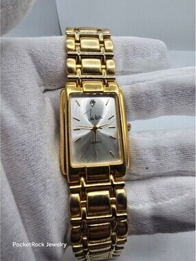 John Weitz Women’s Silver Dial Gold Tone Bracelet Watch